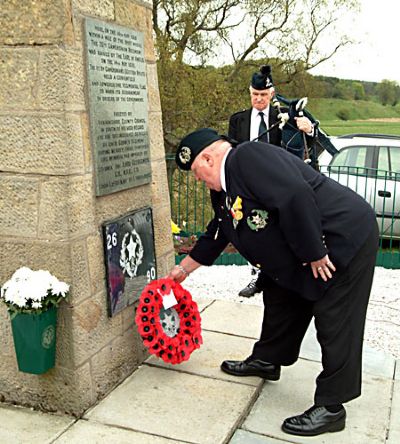 c mccready lays wreath at the cameronian cairn 2006